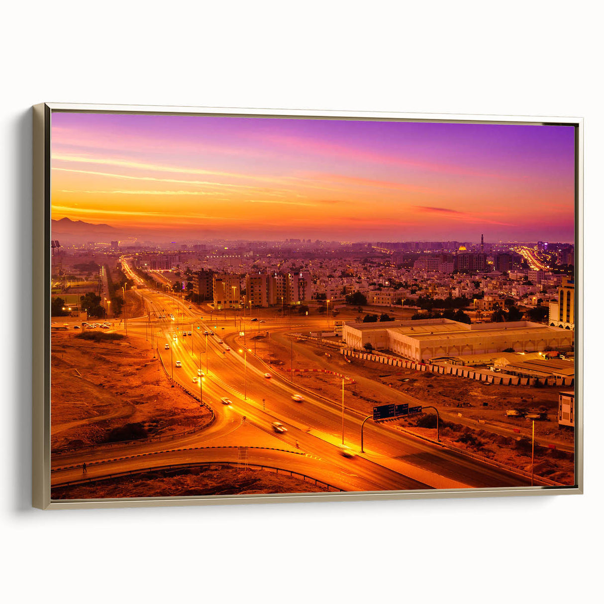 Framed canvas featuring a vintage-style landscape of Oman with black and gold tones, ideal for bedroom wall art.