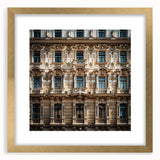 Extra large abstract art print of a Middle Eastern desert scenery in gold and beige tones on a framed canvas.