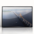 Large abstract wall art depicting a stylized Brazilian landscape in vivid colors, framed in black acrylic.