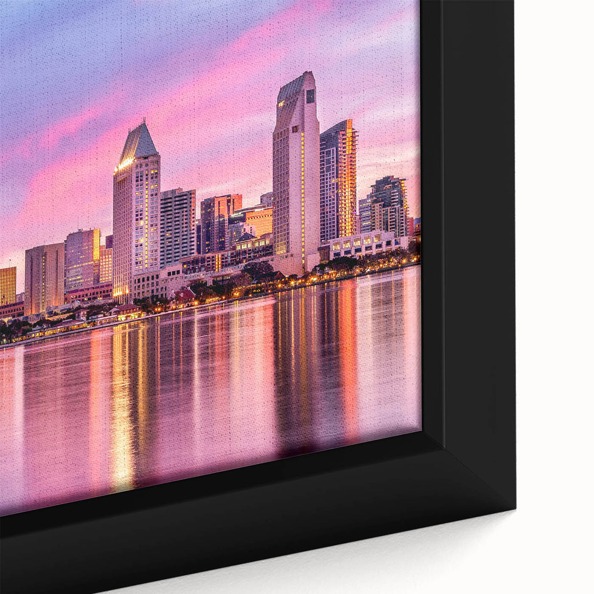 Black wall art featuring a textured, colorful depiction of the San Diego skyline on a framed canvas.