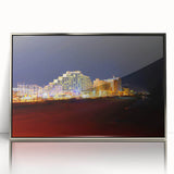 Mid-century modernist art depicting Daytona scenery in muted blue and green tones on a silver-framed acrylic print.