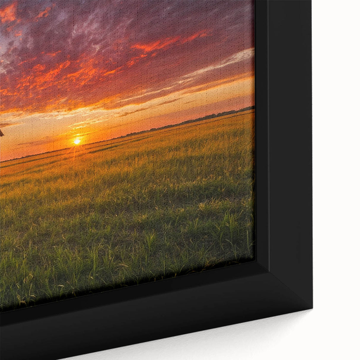 Close-up of textured black wall art featuring a colorful Iowa scenery on a framed canvas, ideal for living room decor.