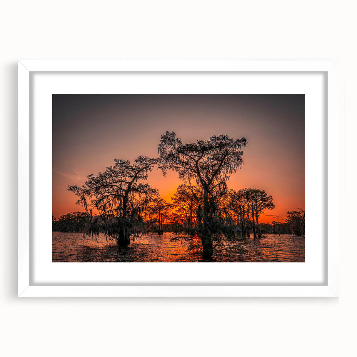 Abstract art print of Louisiana scenery in muted earth tones on a white framed mat, suitable for dining room decor.