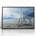 Large abstract wall art depicting a serene Maine landscape in muted blue and green tones, framed in black acrylic.