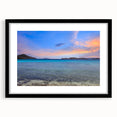 Extra large abstract art print of Charlotte skyline in vibrant colors on textured canvas, framed in black.