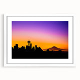 Abstract art print of Seattle skyline in muted gray and blue tones on a framed white mat.