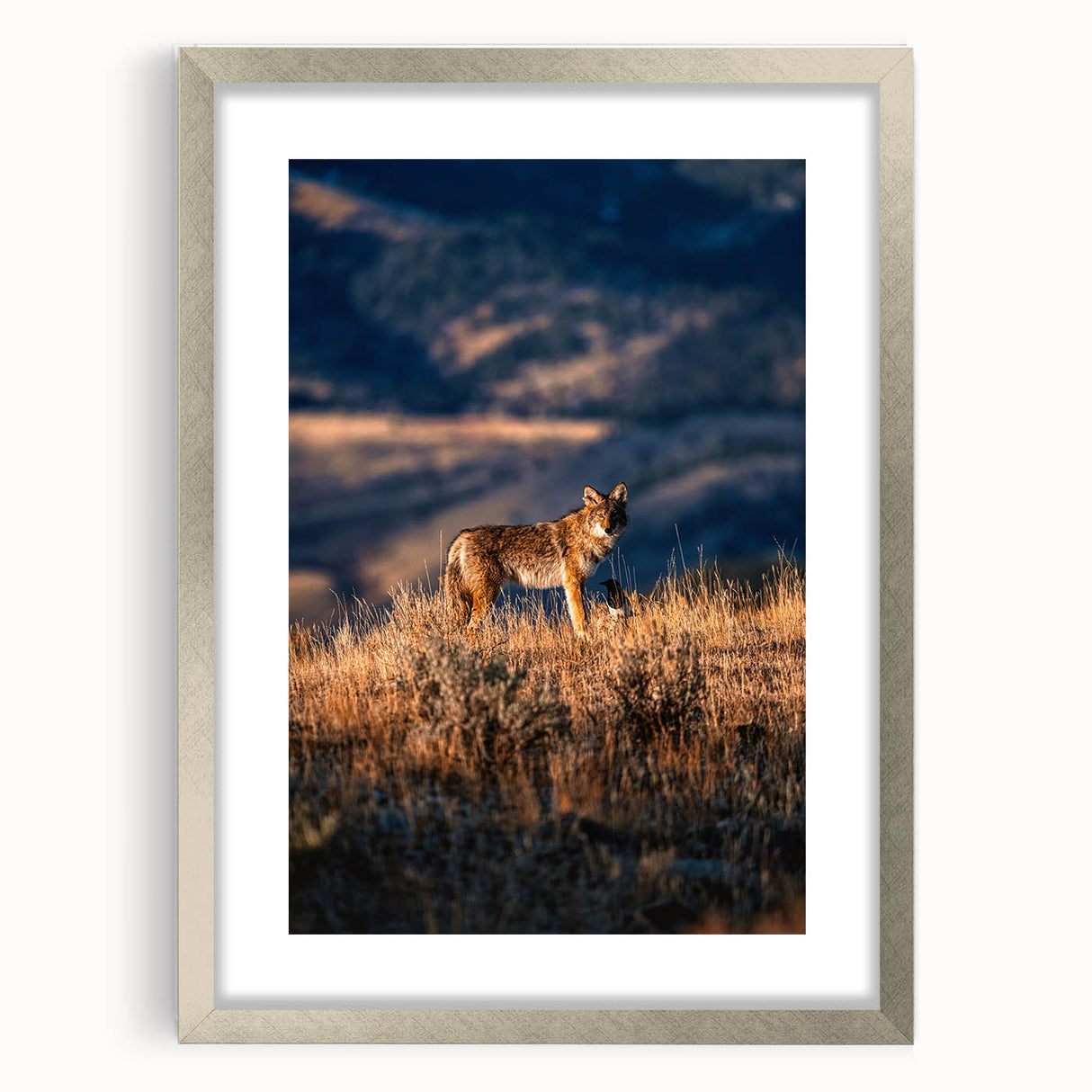 Textured art depicting abstract Yellowstone scenery in muted earth tones, framed in silver, ideal for bedroom decor.