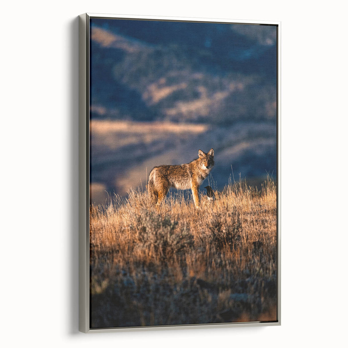 Framed canvas depicting a vintage-style Yellowstone landscape in colorful hues.