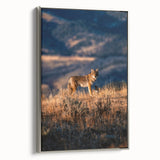 Framed canvas depicting a vintage-style Yellowstone landscape in colorful hues.