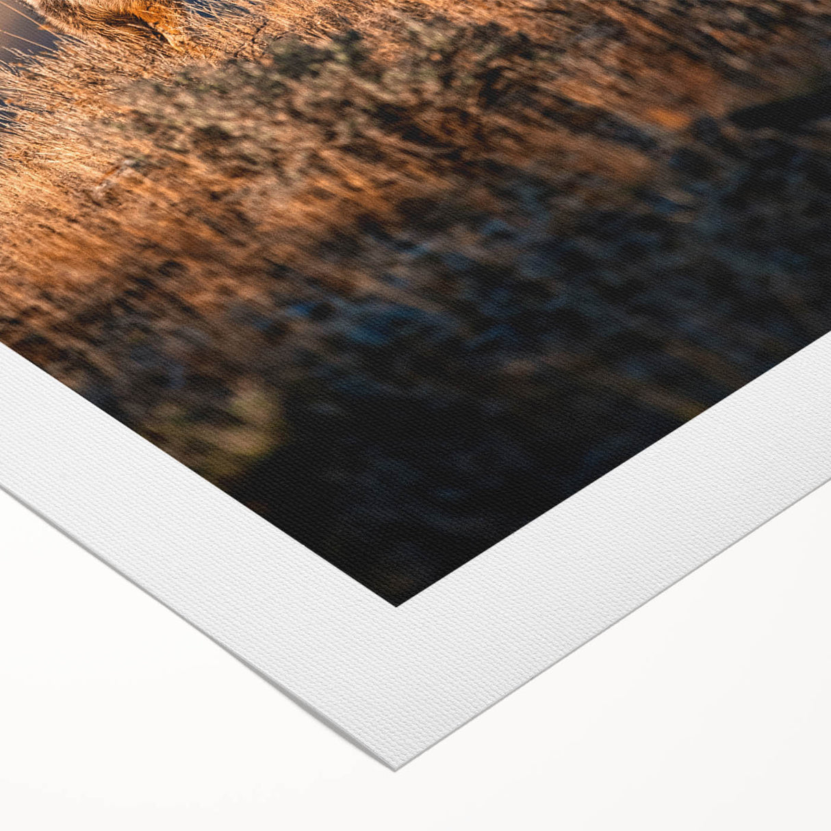Art deco poster of Yellowstone scenery on rolled canvas, featuring muted green and brown tones.