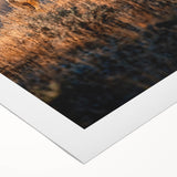 Art deco poster of Yellowstone scenery on rolled canvas, featuring muted green and brown tones.