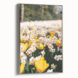 Framed canvas featuring a vintage-style landscape painting with colorful spring scenery, ideal for brightening a living room.