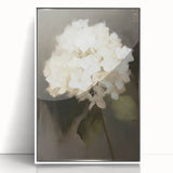 Framed acrylic artwork showcasing an abstract floral design with vibrant colors on a white background, perfect for modern home decor or office spaces.