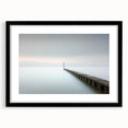 Abstract landscape art print in a sleek black frame with a white mat, showcasing vibrant colors and textured details, ideal for modern home decor.