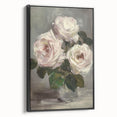 Framed canvas artwork featuring an abstract floral design in vibrant colors, displayed in a sleek black frame, ideal for modern home decor.