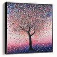 Framed canvas artwork showcasing an abstract floral design with vibrant colors, displayed in a sleek black frame, adding elegance to any modern decor. Ideal for enhancing living spaces or offices.