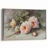 Framed canvas artwork showcasing an abstract floral design in vibrant colors, elegantly displayed with a silver frame, perfect for modern decor.