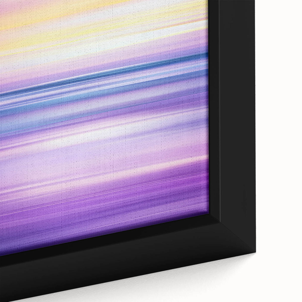 Close-up of a framed canvas artwork depicting an abstract landscape with vibrant colors, showcasing intricate details and textures ideal for modern home decor.