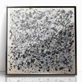 Framed acrylic artwork showcasing vibrant abstract splatters in shades of blue, orange, and black, perfect for contemporary home decor. Ideal for adding a modern touch to living spaces.