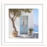 Abstract art print of a Greek door design in muted earth tones, framed with a white mat.