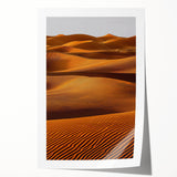 Soft, undulating dunes captured in a stunning landscape print, showcasing delicate shades of beige and gold, rolled for easy shipping and display. Perfect for home decor.