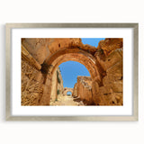 Abstract art print of an Ethiopian landscape in muted earth tones on a framed silver mat.