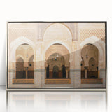 Art Deco style poster of Moroccan scenery in vibrant earth tones, framed in silver acrylic.
