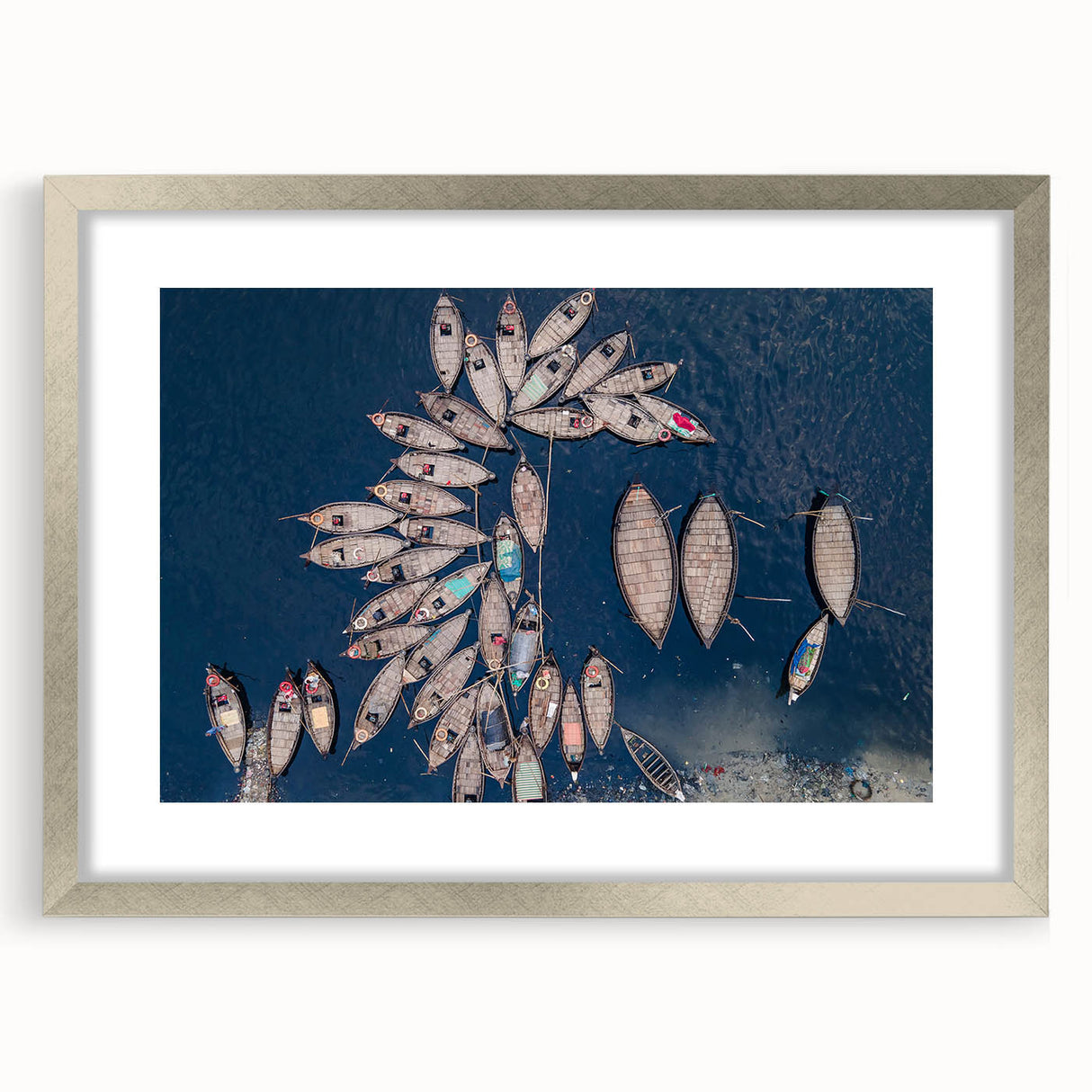 Textured abstract art print of a Bangladesh scenery in muted earth tones on a framed silver mat, suitable for bedroom art.