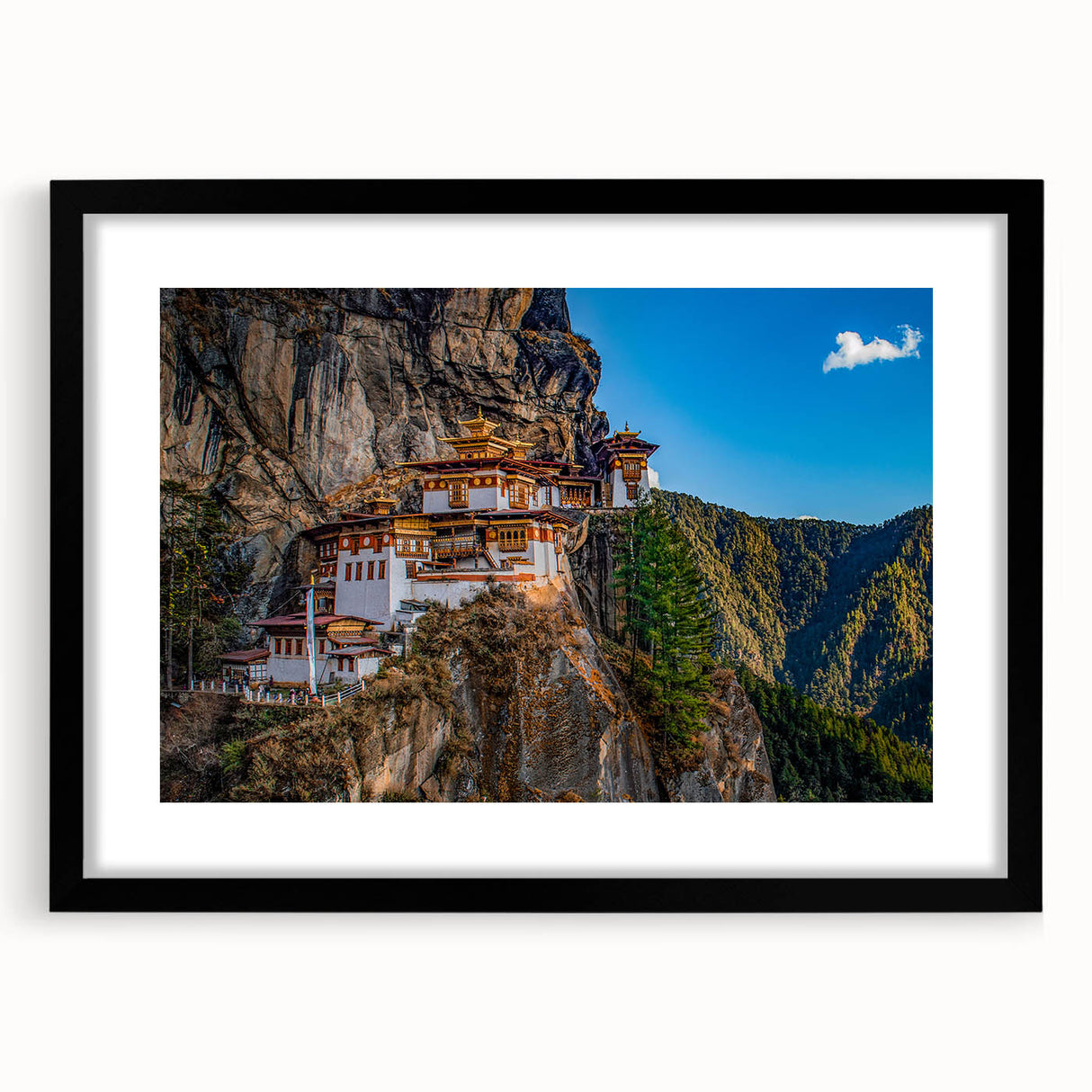 Extra large abstract art print depicting colorful, textured scenery of Bhutan, framed in black, ideal for living room decor.