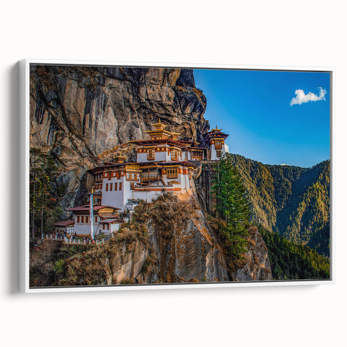 Vintage poster art of Bhutan scenery on a framed canvas, featuring colorful art in extra large size.