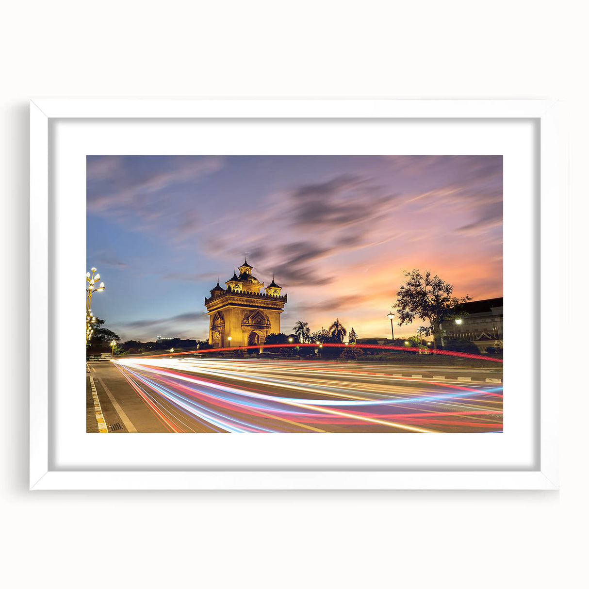 Abstract art print of a Laos scenery in muted earth tones on a white-matted frame, suitable for dining room decor.