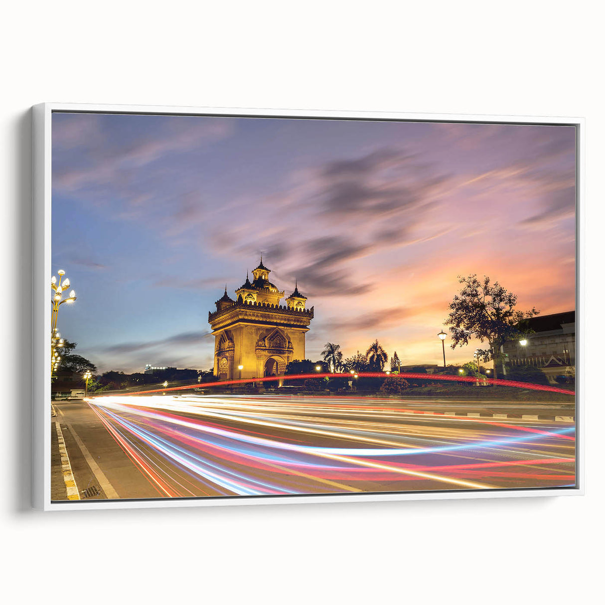 Vintage poster art of a Laos scenery on a framed canvas, featuring colorful art with black accents.