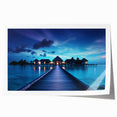 Extra large wall art depicting a serene Maldivian beach scene in soft pastel shades on a rolled canvas.