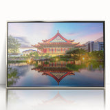 Mid-century modernist art depicting a serene Taiwan landscape in muted green and blue tones, framed in silver acrylic.