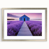 Abstract art print of Perth skyline in muted blue and silver tones, framed with a silver mat.