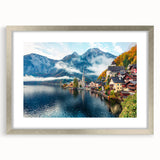 Abstract art print of a textured European scenery in muted earth tones, framed in silver, ideal for living room decor.