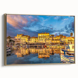 Framed canvas featuring a vintage-style landscape painting of southern France in muted gold and black tones.