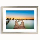 Extra large abstract art print of a textured European scenery in muted earth tones, framed in silver.