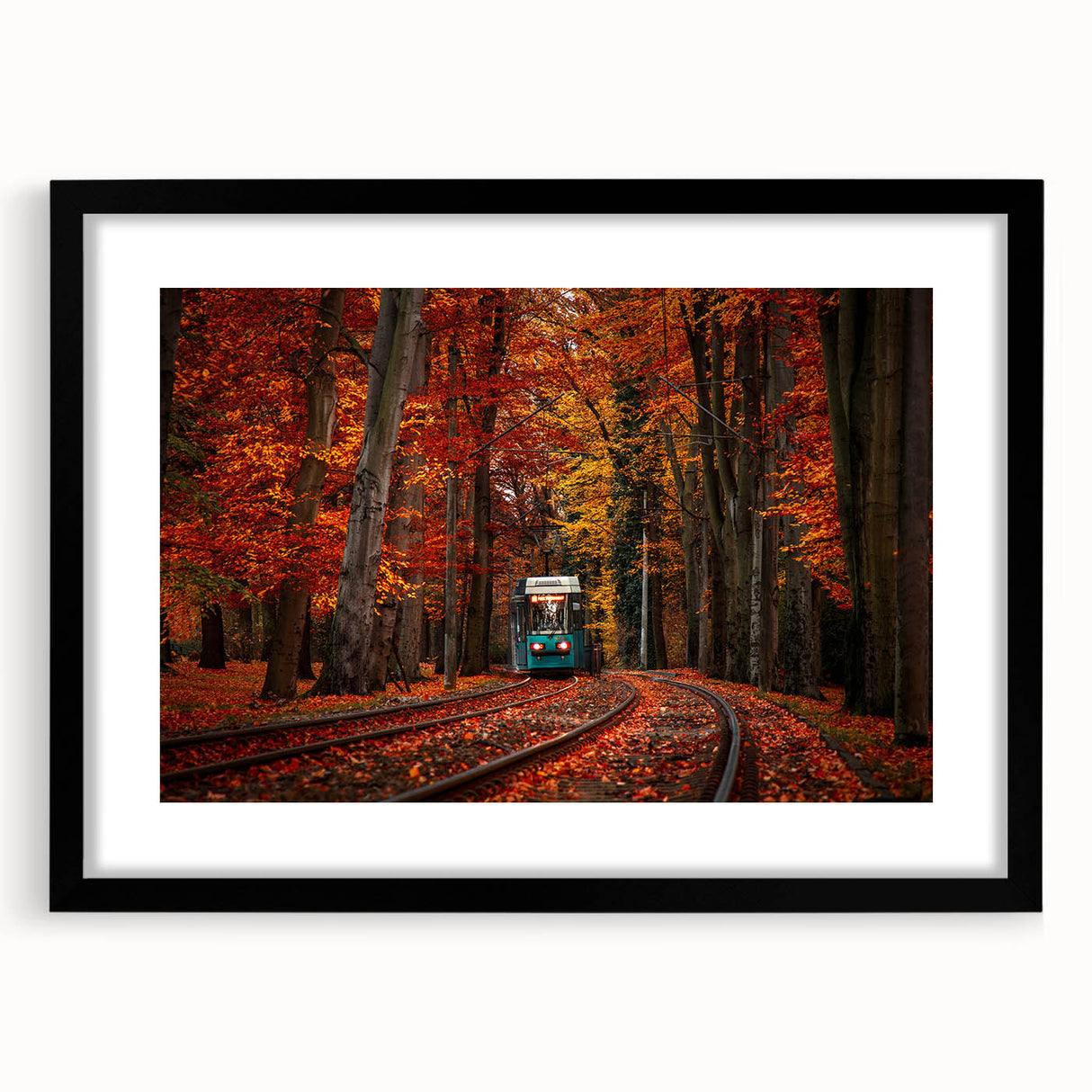 Abstract art print of a colorful European landscape in a black frame with mat, ideal for living room decor.
