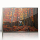 Large art print of a European cityscape in muted gray and blue tones on a silver-framed acrylic.