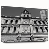 Large abstract depiction of Madrid in muted orange and blue shades on acrylic glass.
