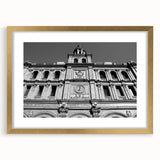 Extra large abstract art print of Madrid's skyline in textured gold tones on a framed canvas, ideal for living room decor.