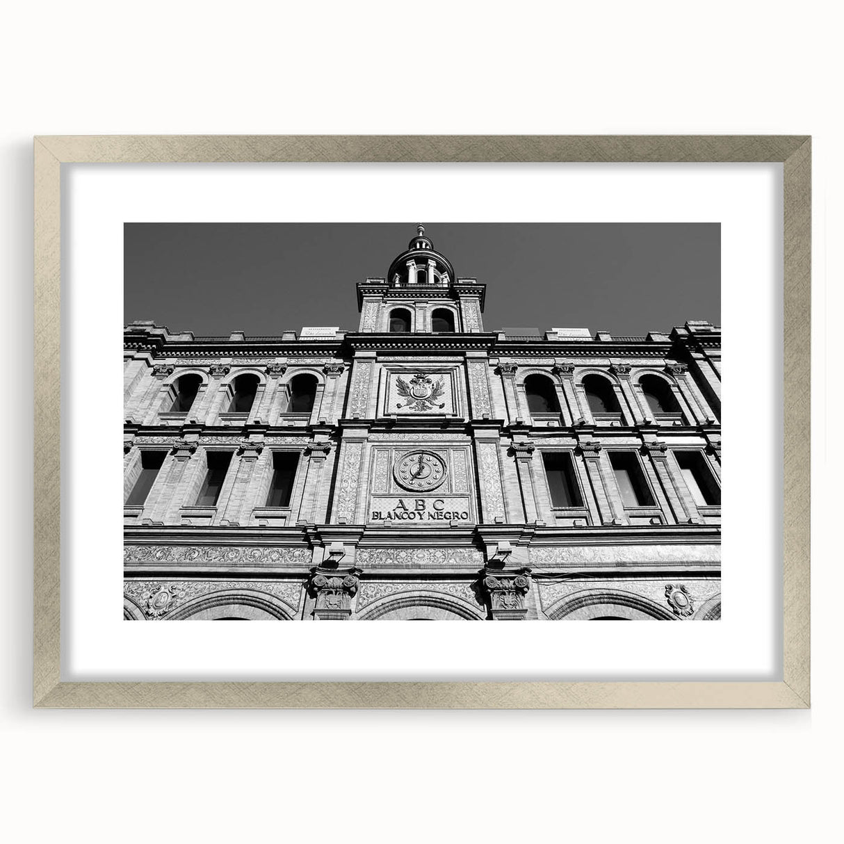 Textured abstract art print of Madrid skyline in muted earth tones on a framed canvas, suitable for bedroom decor.