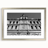 Textured abstract art print of Madrid skyline in muted earth tones on a framed canvas, suitable for bedroom decor.