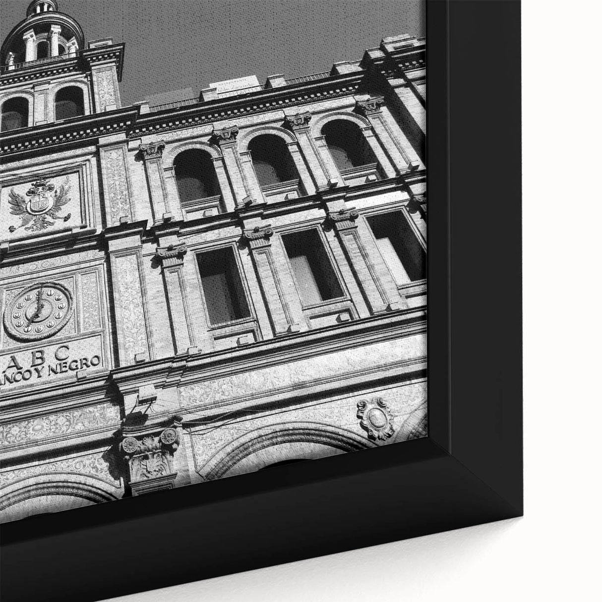 Black wall art depicting a textured Madrid cityscape in vibrant colors on a framed canvas, ideal for living room decor.