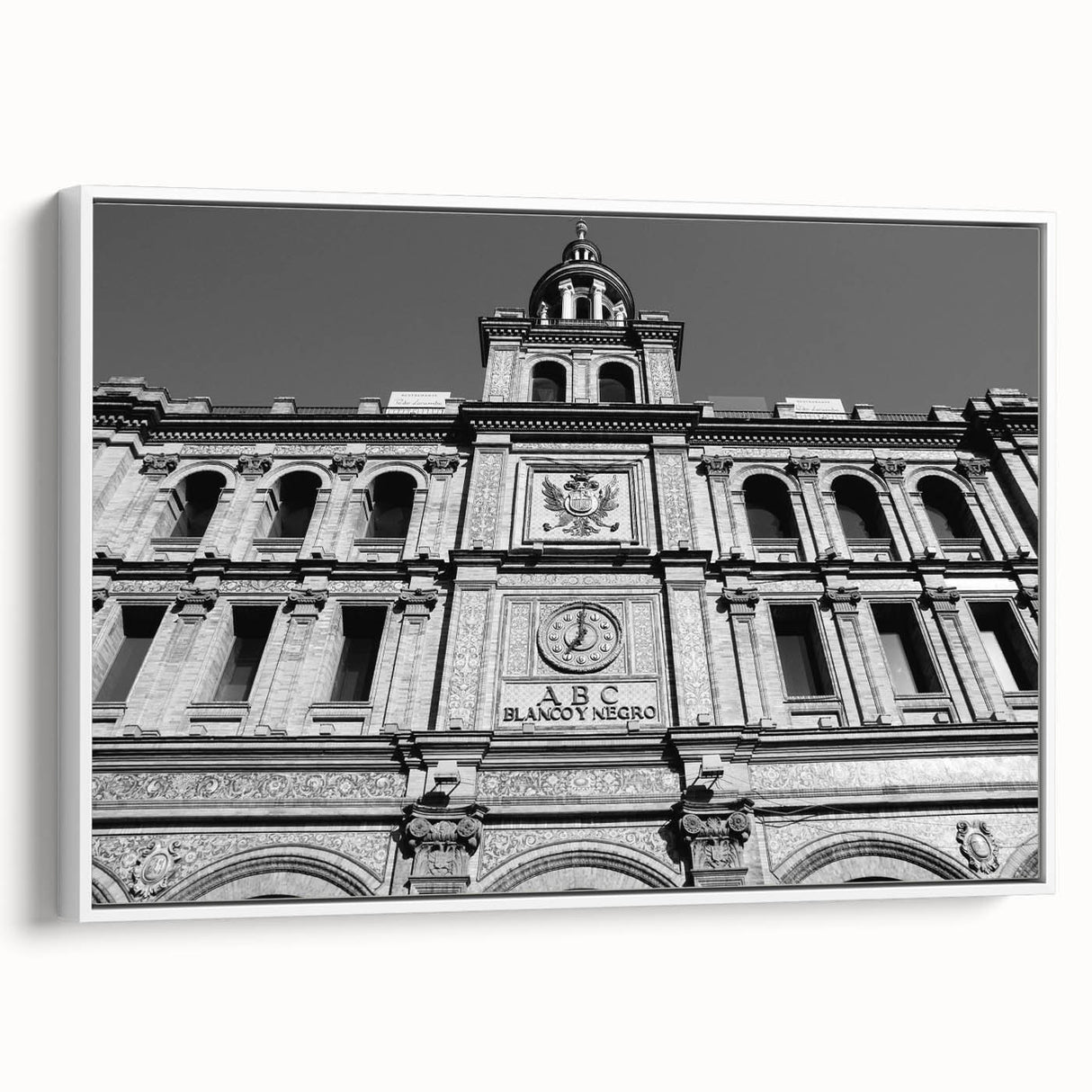 Vintage poster art of Madrid skyline with vibrant colors on a large framed canvas, ideal for living room decor.