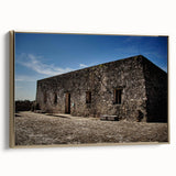 Framed canvas featuring a vintage-style landscape painting of Quintana Roo, Mexico, with muted earth tones.