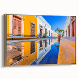 Framed canvas of a vintage Yucatan landscape in black and gold tones, ideal for bedroom wall art.