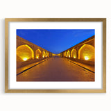 Extra large wall art depicting a textured abstract scenery of Middle-Eastern Iran, in gold and earth tones, framed with mat.