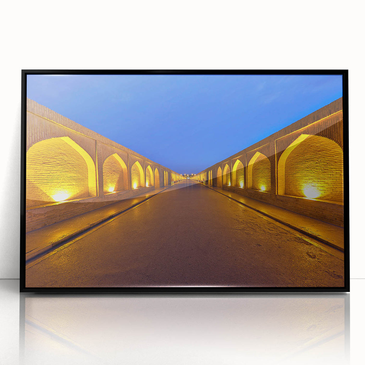 Large abstract wall art depicting a Middle Eastern scenery in muted earth tones on a framed acrylic.